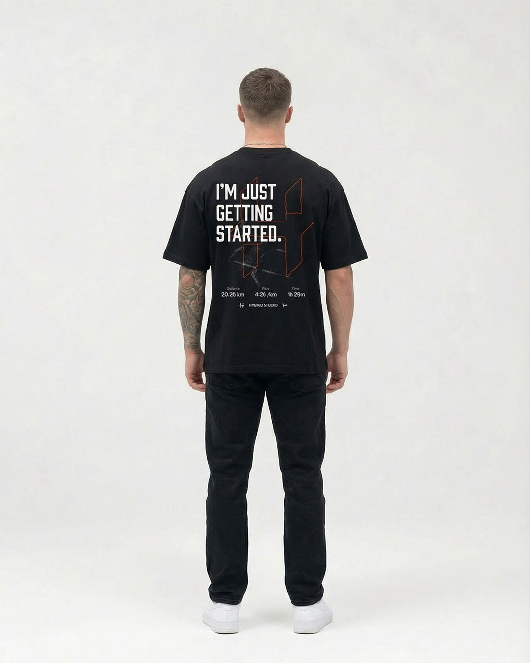 "I'M JUST GETTING STARTED" BLACK OVERSIZED T-SHIRT